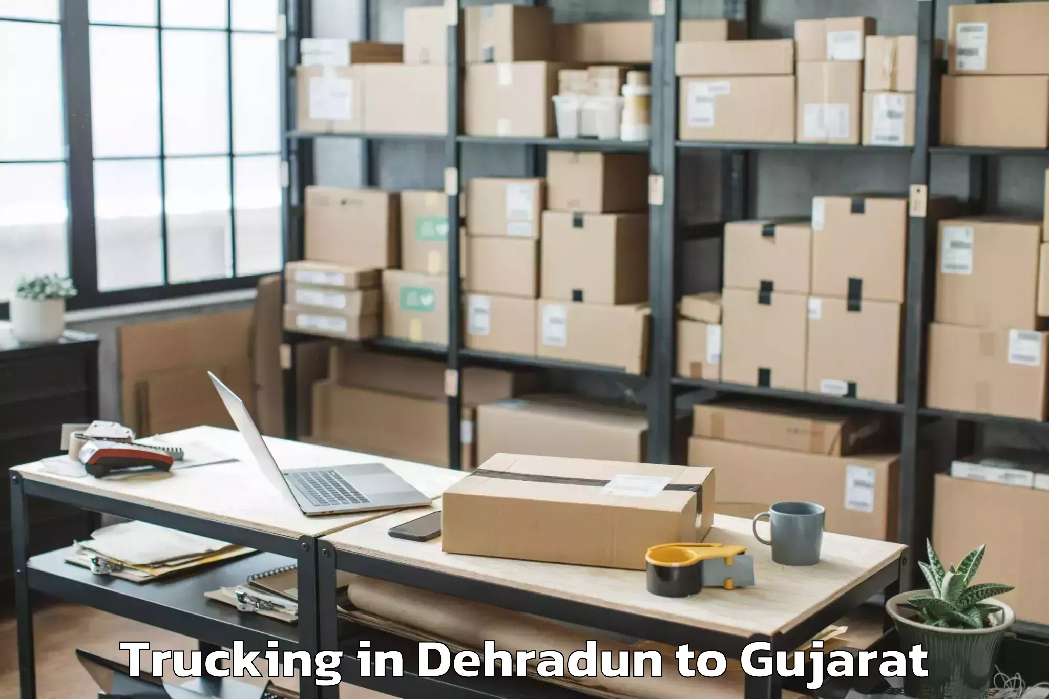 Book Dehradun to Vijapur Trucking Online